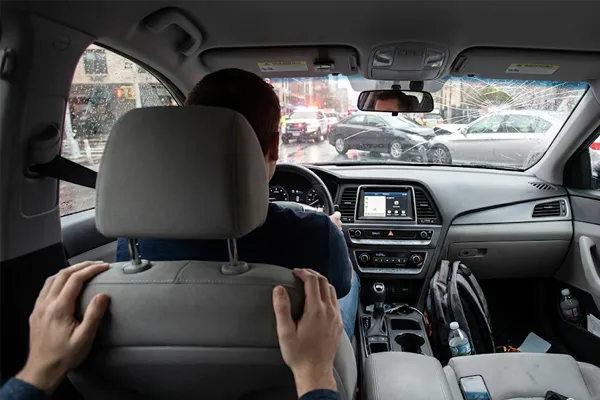 Backseat passenger view inside a Lyft vehicle during a collision in San Diego.