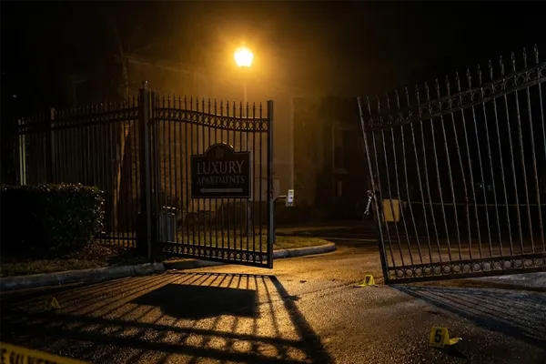 Broken security gate at San Diego apartment complex illustrating negligence and lack of access control.